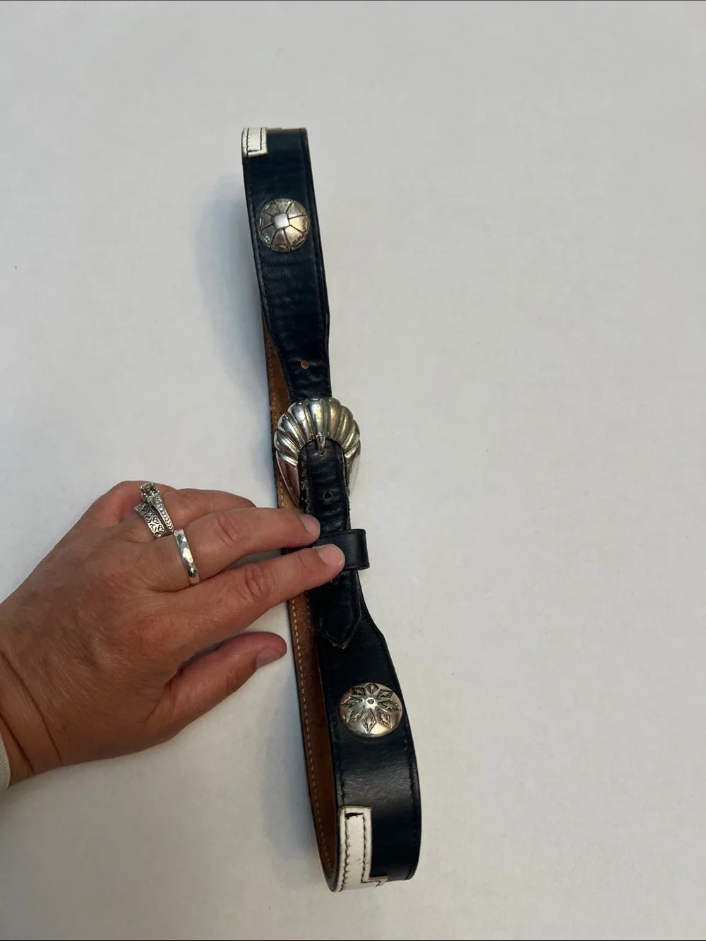 JUSTIN VINTAGE BLACK & WHITE LEATHER BELT AZTEC WITH SILVER  CONCHOS SIZE 28